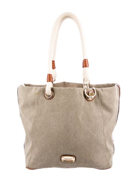 michael kors purses canvas|Michael Kors black canvas tote.